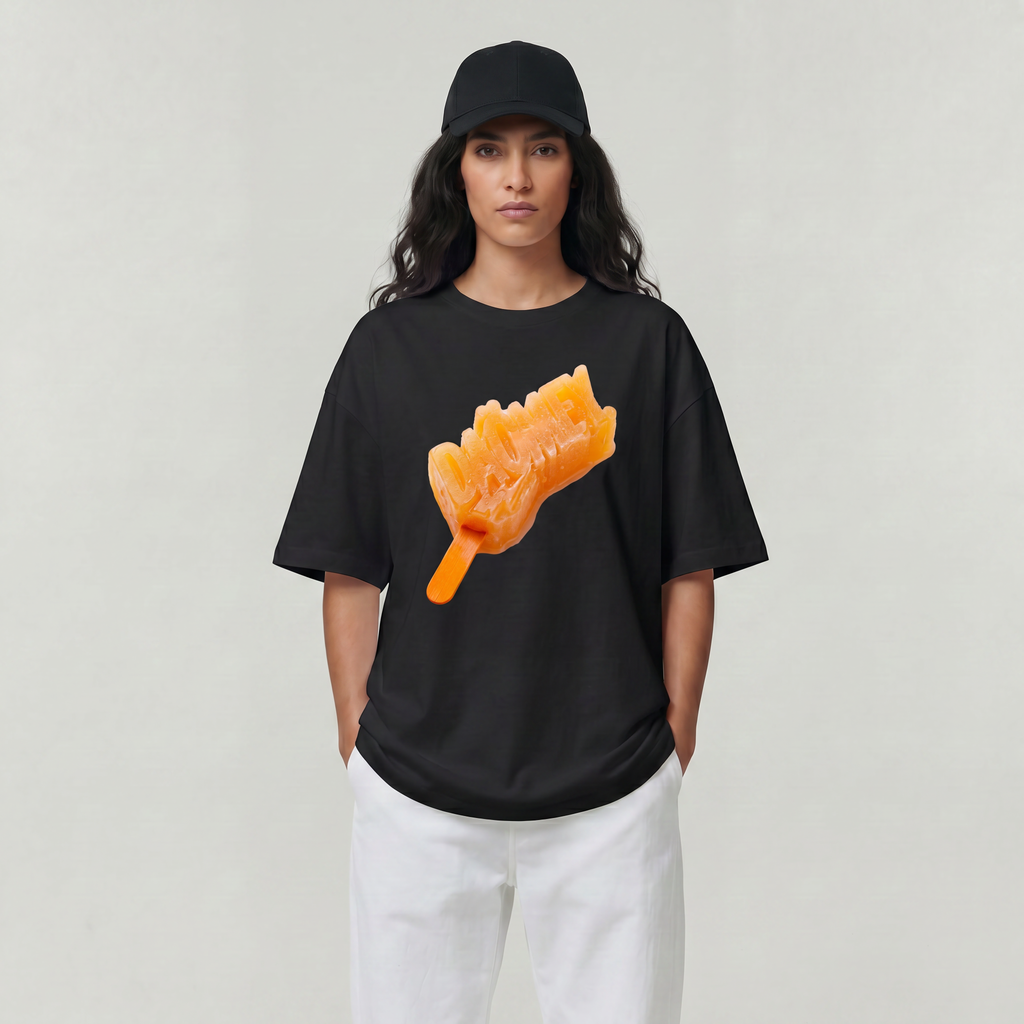 Person wearing a black t-shirt with an orange graphic design on a plain background